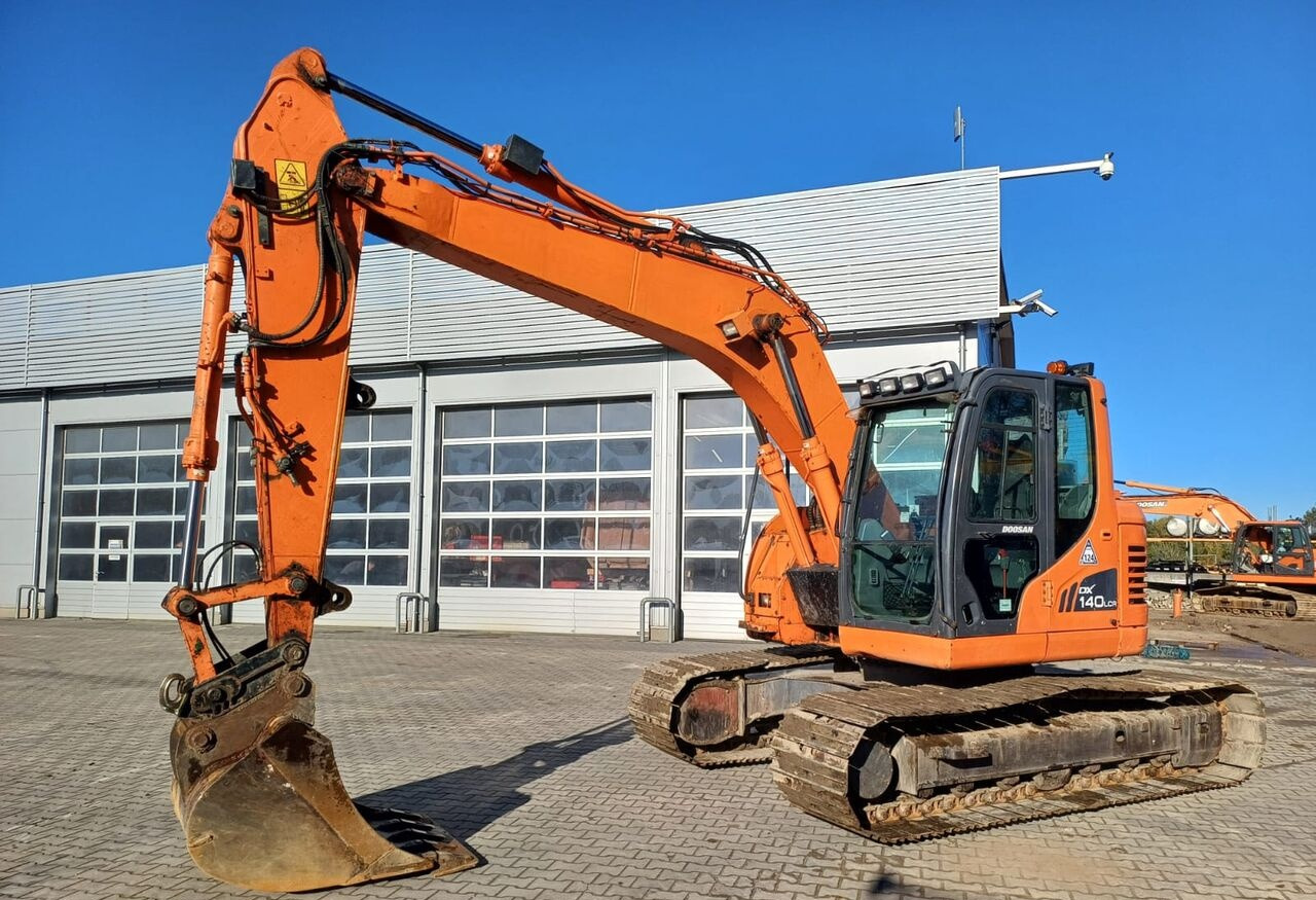 Doosan DX140LCR-3 - Гусеничний екскаватор: фото 1 Doosan DX140LCR-3 - Гусеничний екскаватор: фото 1