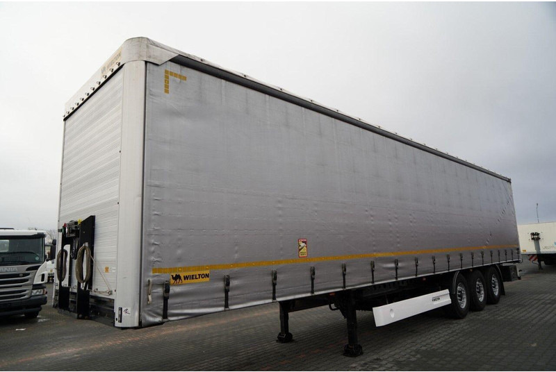 Wielton FIRANKA / STANDARD / OŚ PODNOSZONA / PLANDEKA ZBROJONA - Тентований напівпричіп: фото 4 Wielton FIRANKA / STANDARD / OŚ PODNOSZONA / PLANDEKA ZBROJONA - Тентований напівпричіп: фото 4