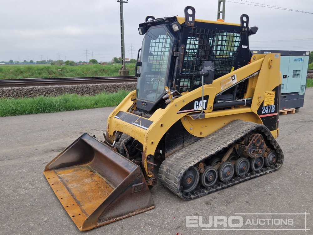 2006 CAT 247B - Міні-навантажувач: фото 1 2006 CAT 247B - Міні-навантажувач: фото 1