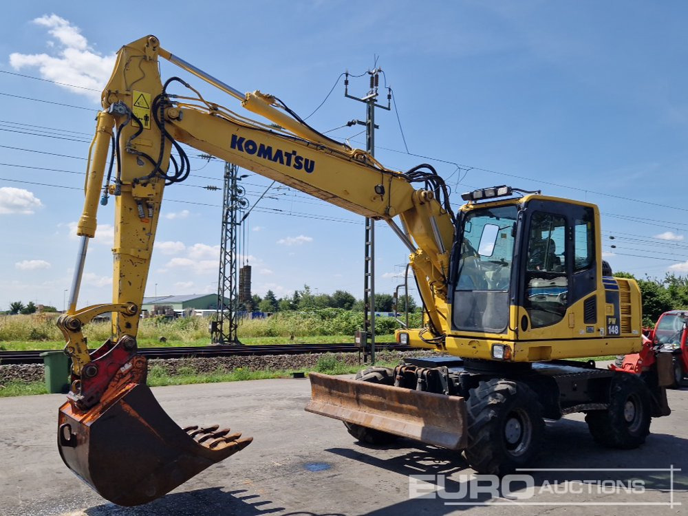 2011 Komatsu PW148-8 - Колісний екскаватор: фото 1 2011 Komatsu PW148-8 - Колісний екскаватор: фото 1