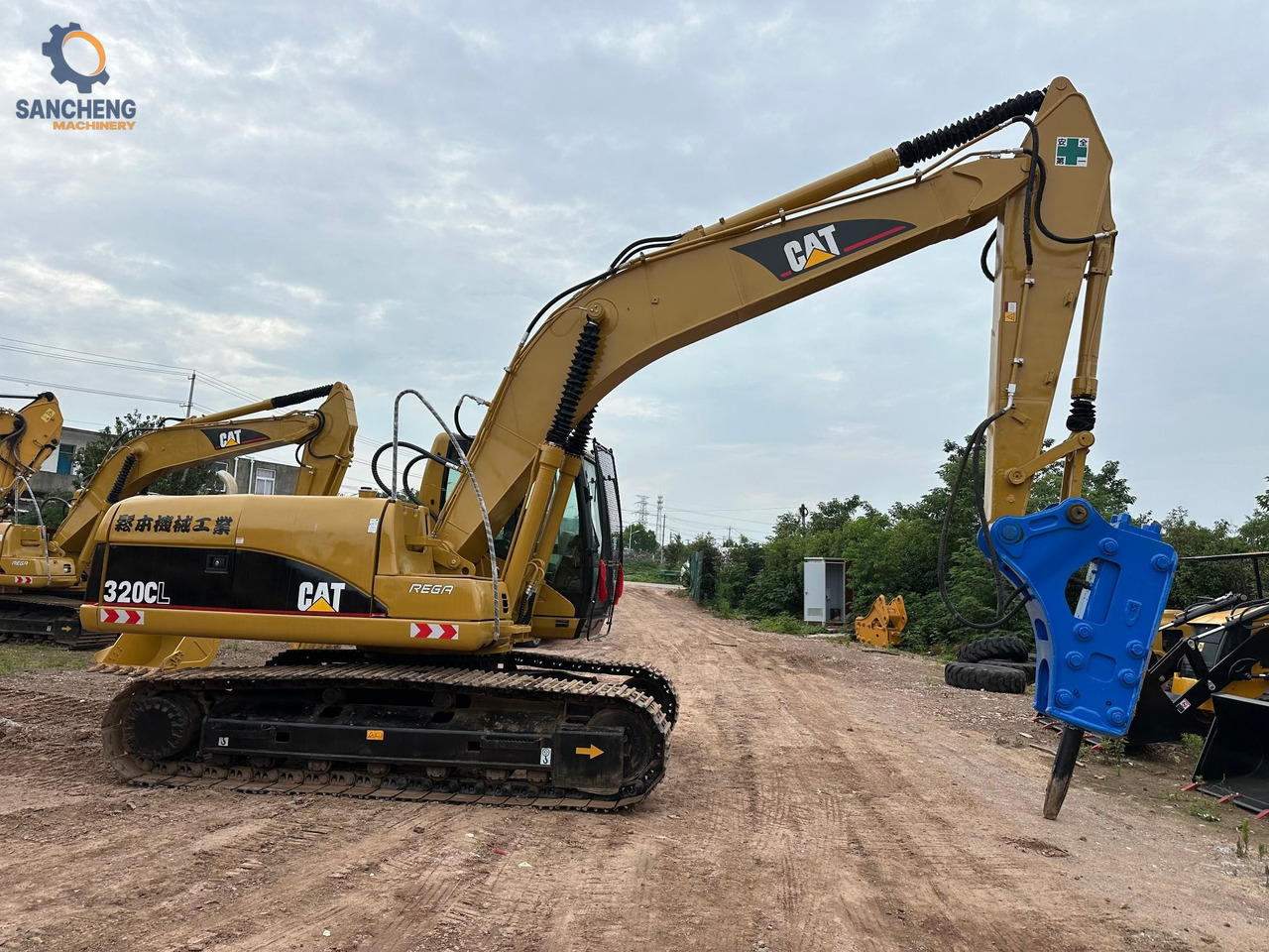 CAT 320CL with hammer - Гусеничний екскаватор: фото 1 CAT 320CL with hammer - Гусеничний екскаватор: фото 1