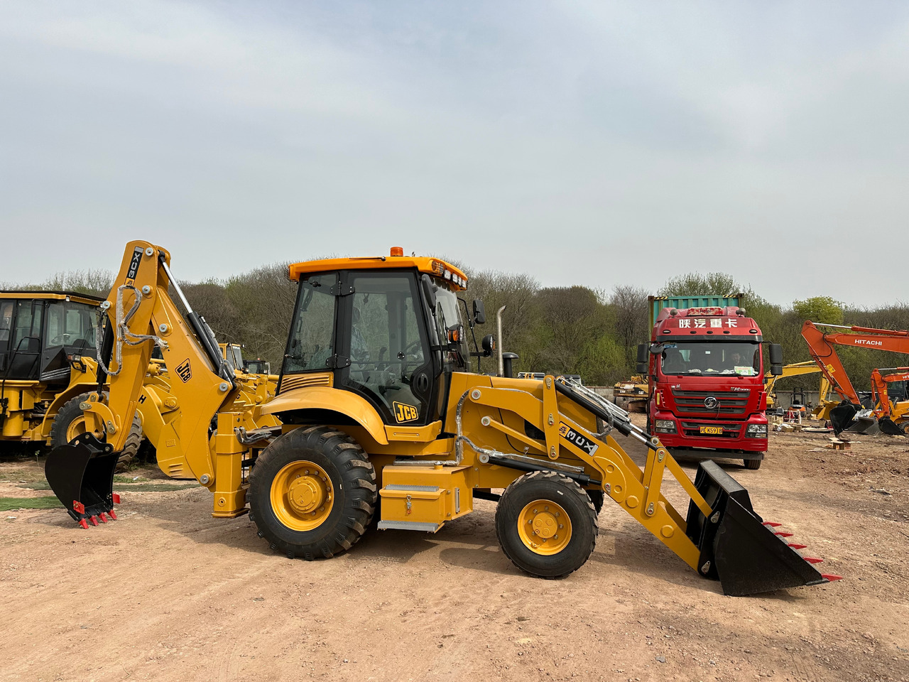 JCB 3CX - Екскаватор-навантажувач: фото 1 JCB 3CX - Екскаватор-навантажувач: фото 1