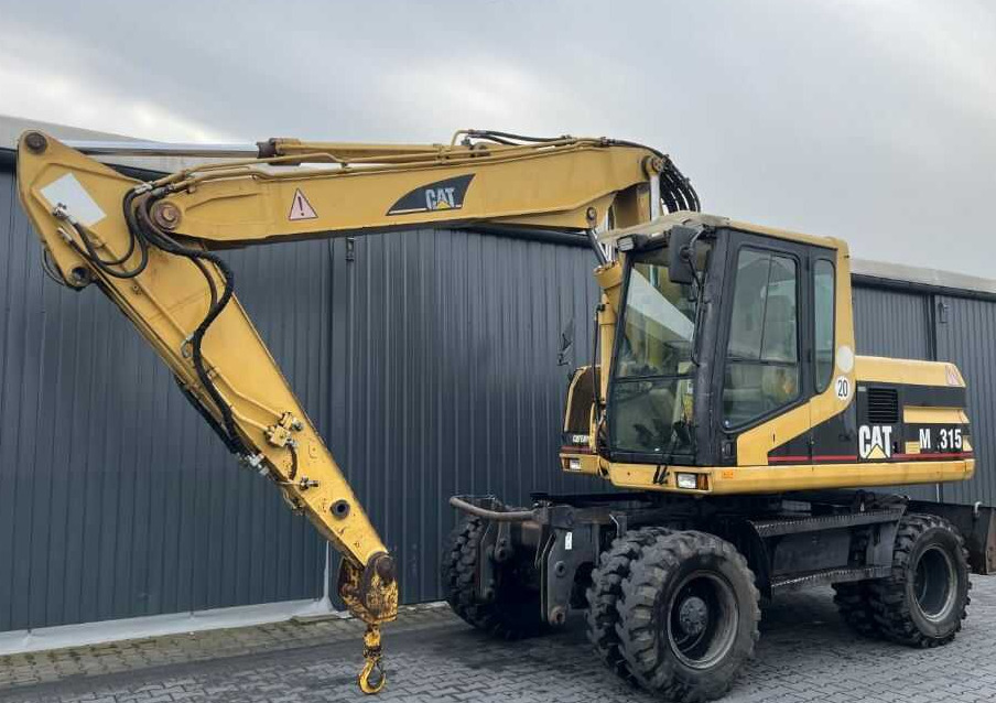 CAT Lift Trucks M315 - Колісний екскаватор: фото 1 CAT Lift Trucks M315 - Колісний екскаватор: фото 1