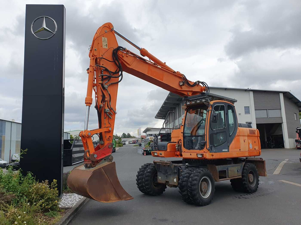 Doosan DX190W / 2008 / 12.349h / 1x Tieflöffel - Колісний екскаватор: фото 1 Doosan DX190W / 2008 / 12.349h / 1x Tieflöffel - Колісний екскаватор: фото 1