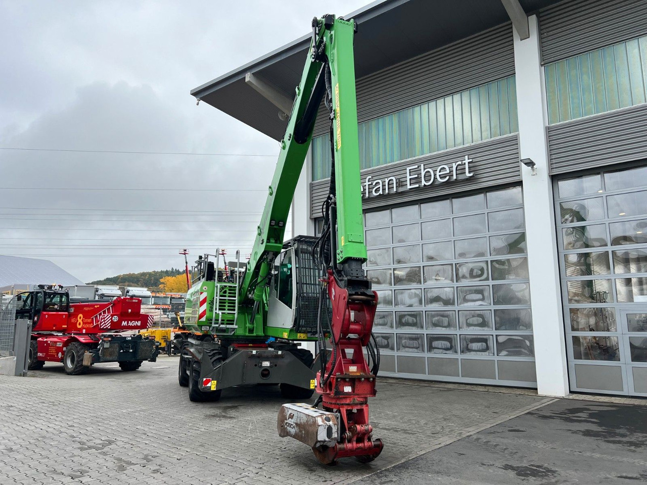 Sennebogen 718 / inkl. Vosch Fällzange / nur 1.965h! - Колісний екскаватор: фото 3 Sennebogen 718 / inkl. Vosch Fällzange / nur 1.965h! - Колісний екскаватор: фото 3