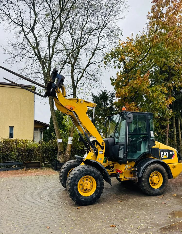 Caterpillar 907H - Колісний навантажувач: фото 1 Caterpillar 907H - Колісний навантажувач: фото 1