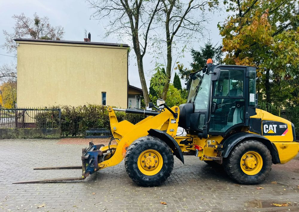 Caterpillar 907H - Колісний навантажувач: фото 4 Caterpillar 907H - Колісний навантажувач: фото 4