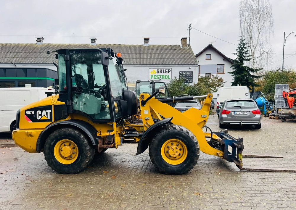 Caterpillar 907H - Колісний навантажувач: фото 5 Caterpillar 907H - Колісний навантажувач: фото 5