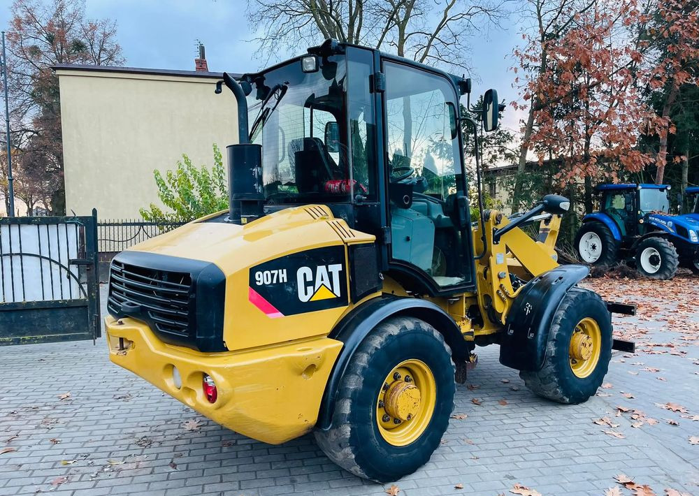 Колісний навантажувач Caterpillar 907H: фото 9
