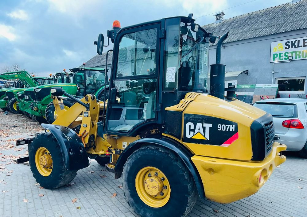 Колісний навантажувач Caterpillar 907H: фото 11