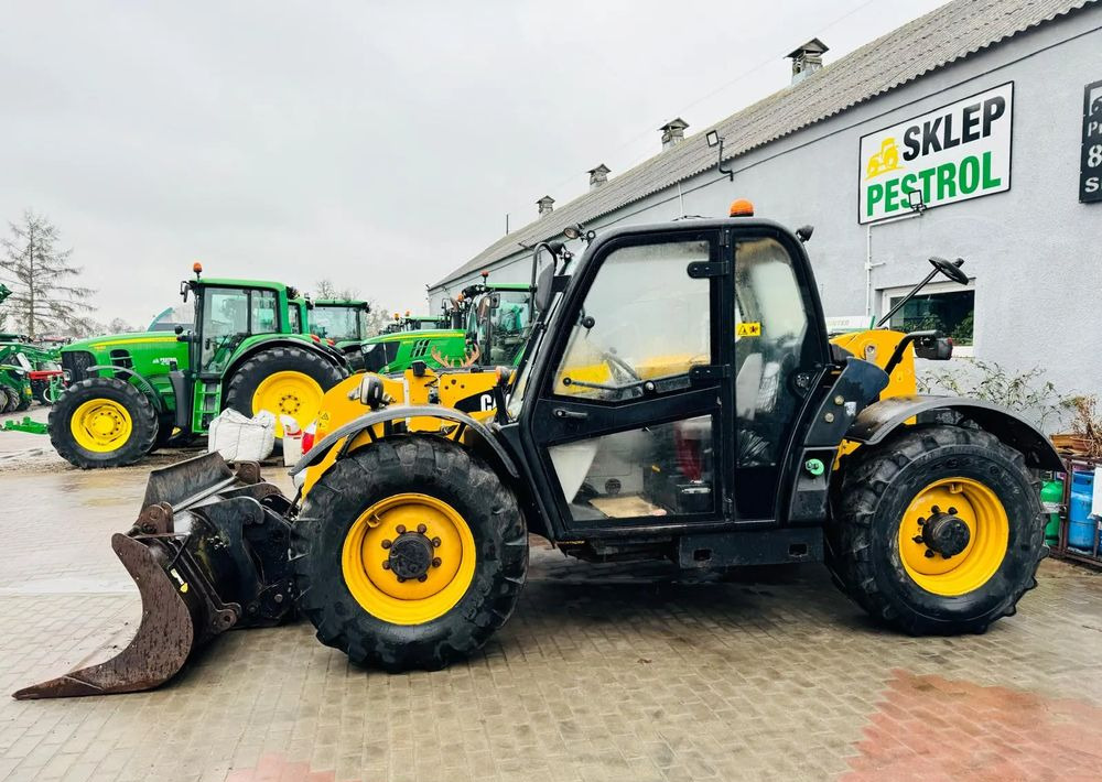 Caterpillar TH 336 - Навантажувач телескопічний: фото 3 Caterpillar TH 336 - Навантажувач телескопічний: фото 3