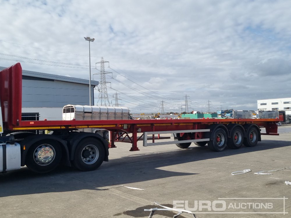 2010 Dennison Tri-Axle - Бортовий напівпричіп/ Платформа: фото 1 2010 Dennison Tri-Axle - Бортовий напівпричіп/ Платформа: фото 1