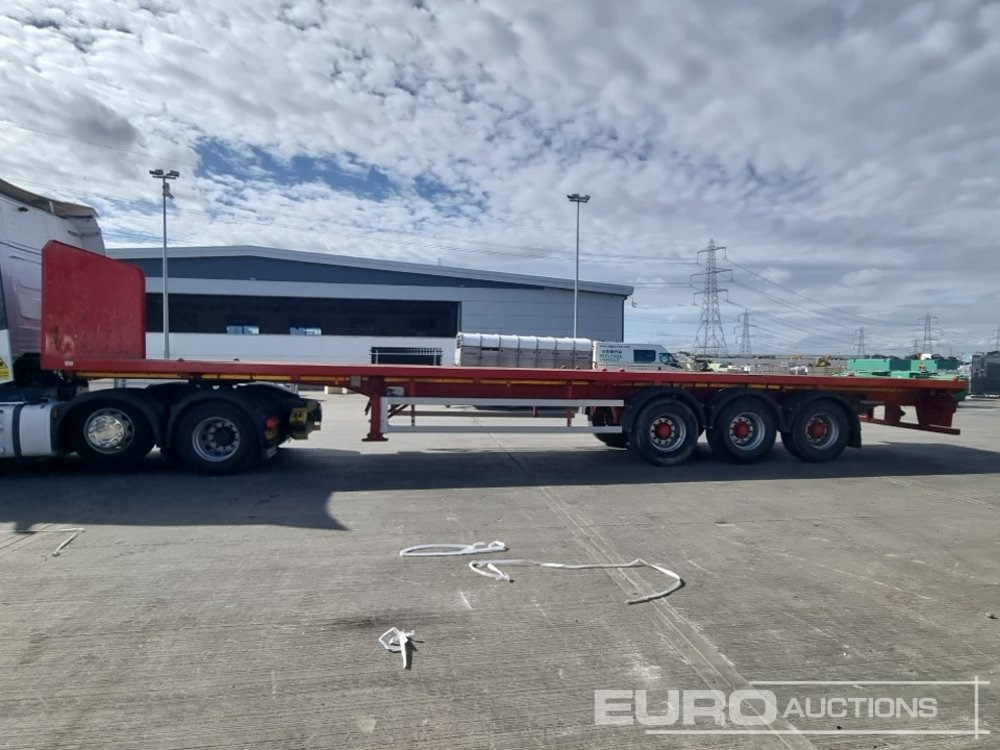 2010 Dennison Tri-Axle - Бортовий напівпричіп/ Платформа: фото 2 2010 Dennison Tri-Axle - Бортовий напівпричіп/ Платформа: фото 2