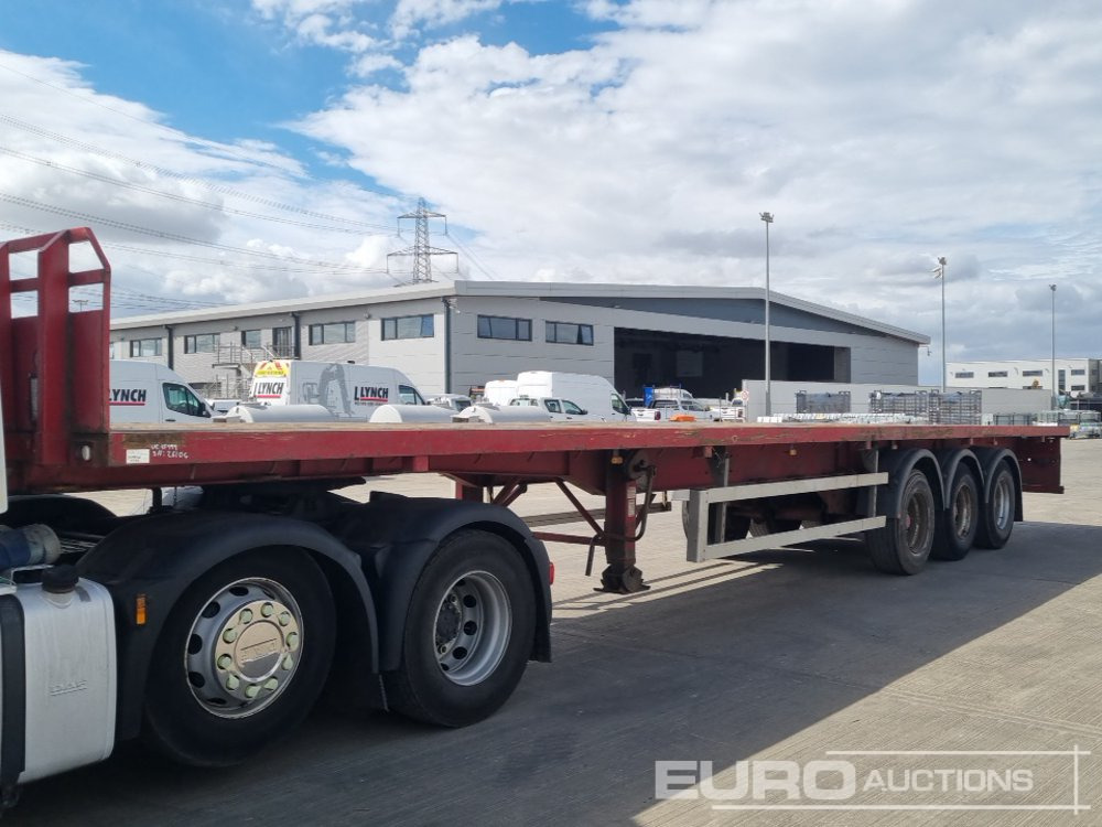 2011 Dennison Tri Axle Flatbed Trailer - Бортовий напівпричіп/ Платформа: фото 1 2011 Dennison Tri Axle Flatbed Trailer - Бортовий напівпричіп/ Платформа: фото 1