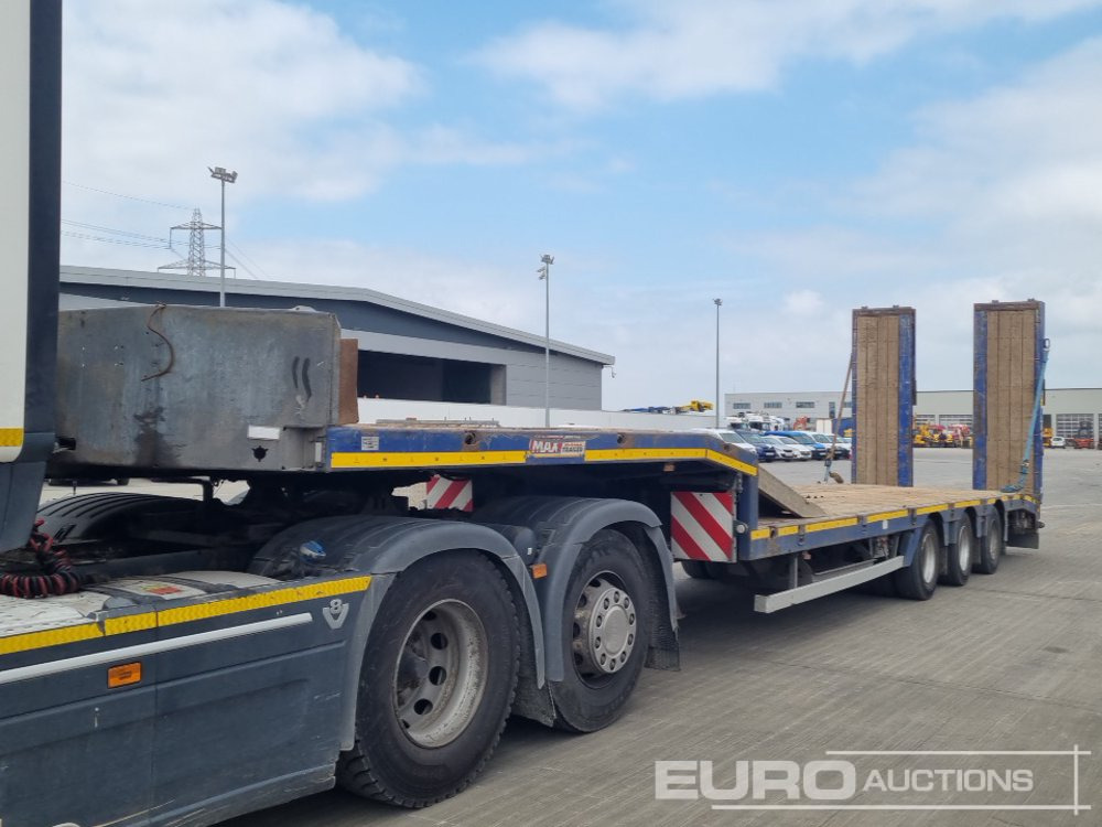 2014 Faymonville Tri Axle Step Frame Low Load Trailer, Neck Ramps, Hydraulic Flip Toe Ramps (Plating Certificate Available) - Низькорамна платформа напівпричіп: фото 1 2014 Faymonville Tri Axle Step Frame Low Load Trailer, Neck Ramps, Hydraulic Flip Toe Ramps (Plating Certificate Available) - Низькорамна платформа напівпричіп: фото 1