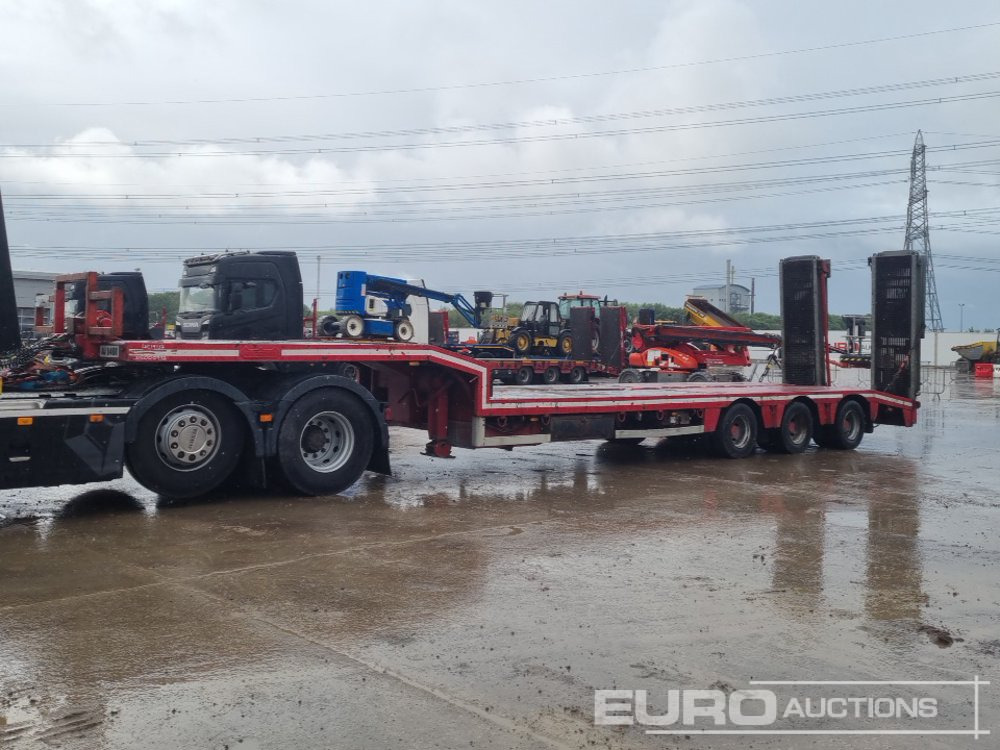 Nooteboom Tri Axle Stepframe Low Loader Trailer, Rear Steer, Hydraulic Fliptoe Ramps, Winch - Низькорамна платформа напівпричіп: фото 1 Nooteboom Tri Axle Stepframe Low Loader Trailer, Rear Steer, Hydraulic Fliptoe Ramps, Winch - Низькорамна платформа напівпричіп: фото 1