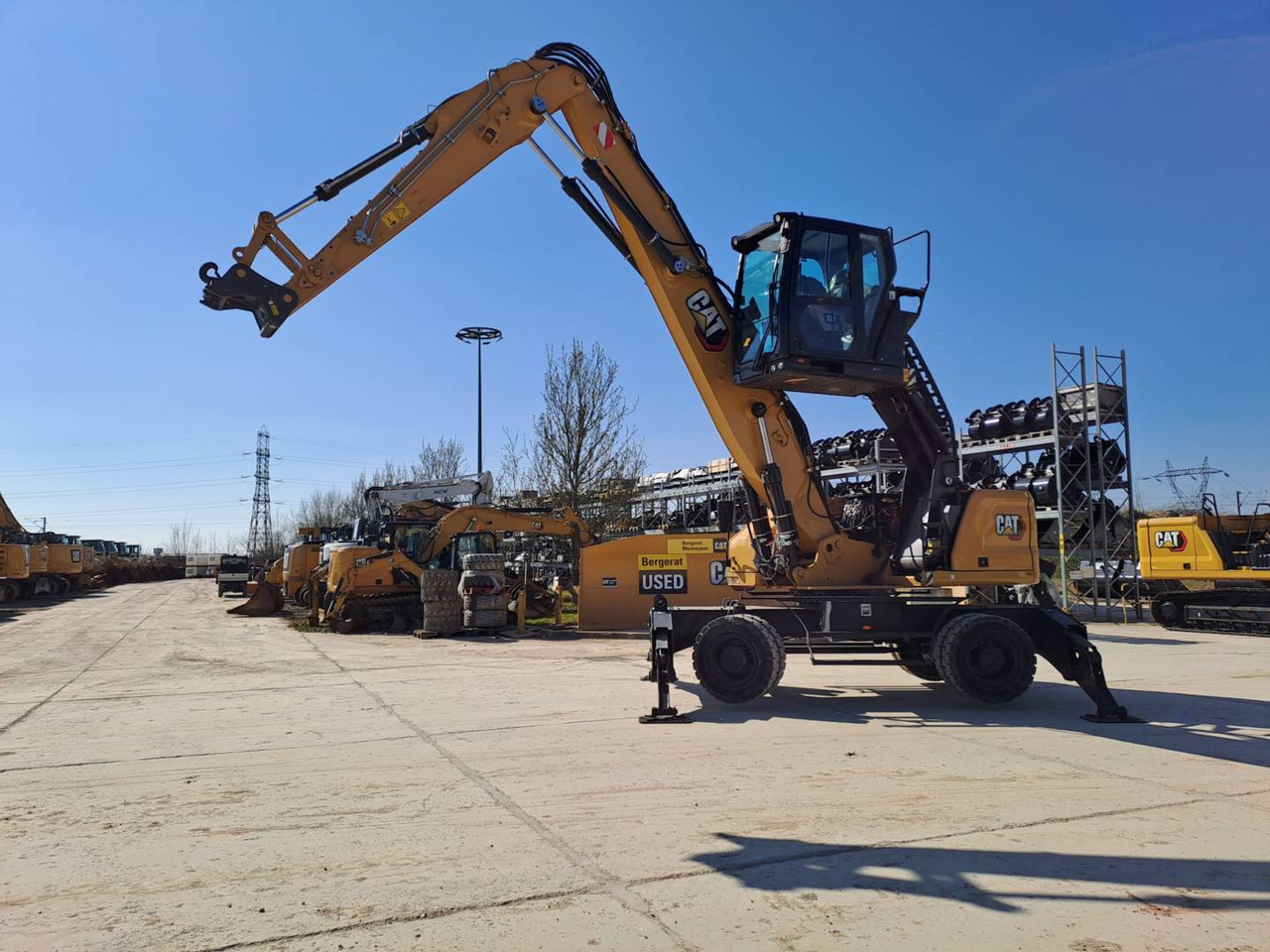 CAT MH3024 - Колісний екскаватор: фото 1 CAT MH3024 - Колісний екскаватор: фото 1