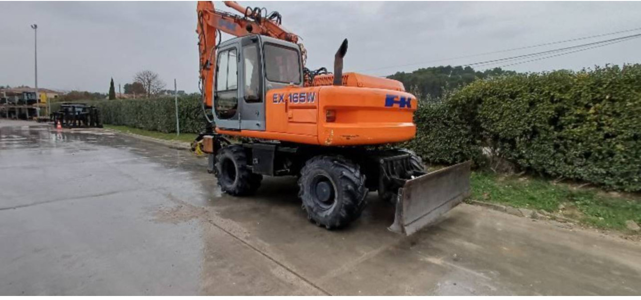 FIAT ALLIS / NEW HOLLAND EX165W - Колісний екскаватор: фото 3 FIAT ALLIS / NEW HOLLAND EX165W - Колісний екскаватор: фото 3