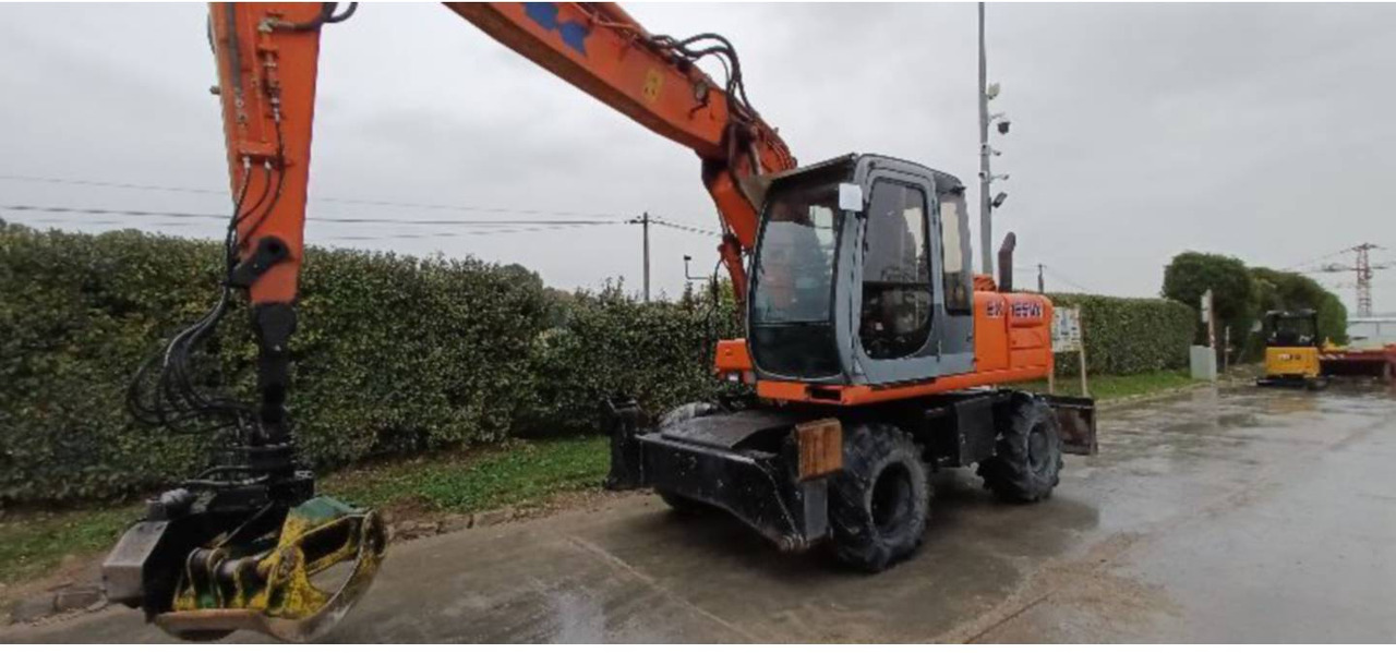 FIAT ALLIS / NEW HOLLAND EX165W - Колісний екскаватор: фото 2 FIAT ALLIS / NEW HOLLAND EX165W - Колісний екскаватор: фото 2