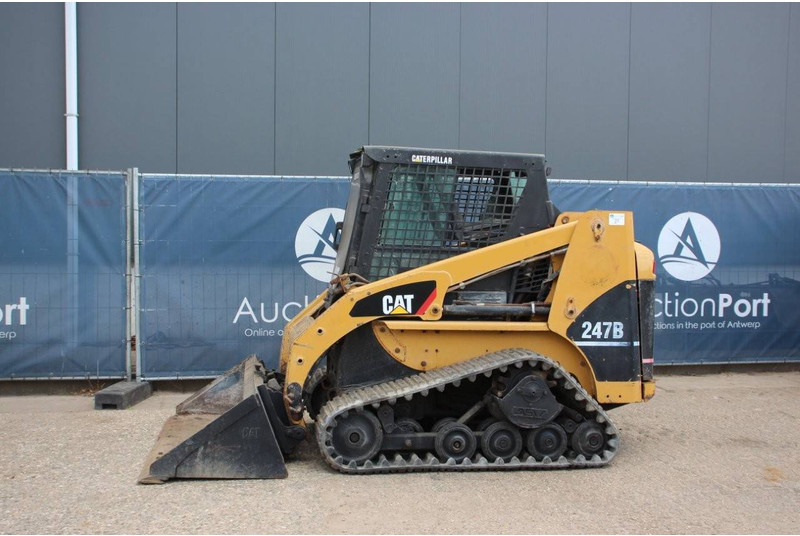 Caterpillar 247B - Гусеничний навантажувач: фото 1 Caterpillar 247B - Гусеничний навантажувач: фото 1