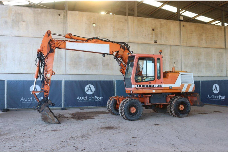 Liebherr A316 - Колісний екскаватор: фото 1 Liebherr A316 - Колісний екскаватор: фото 1