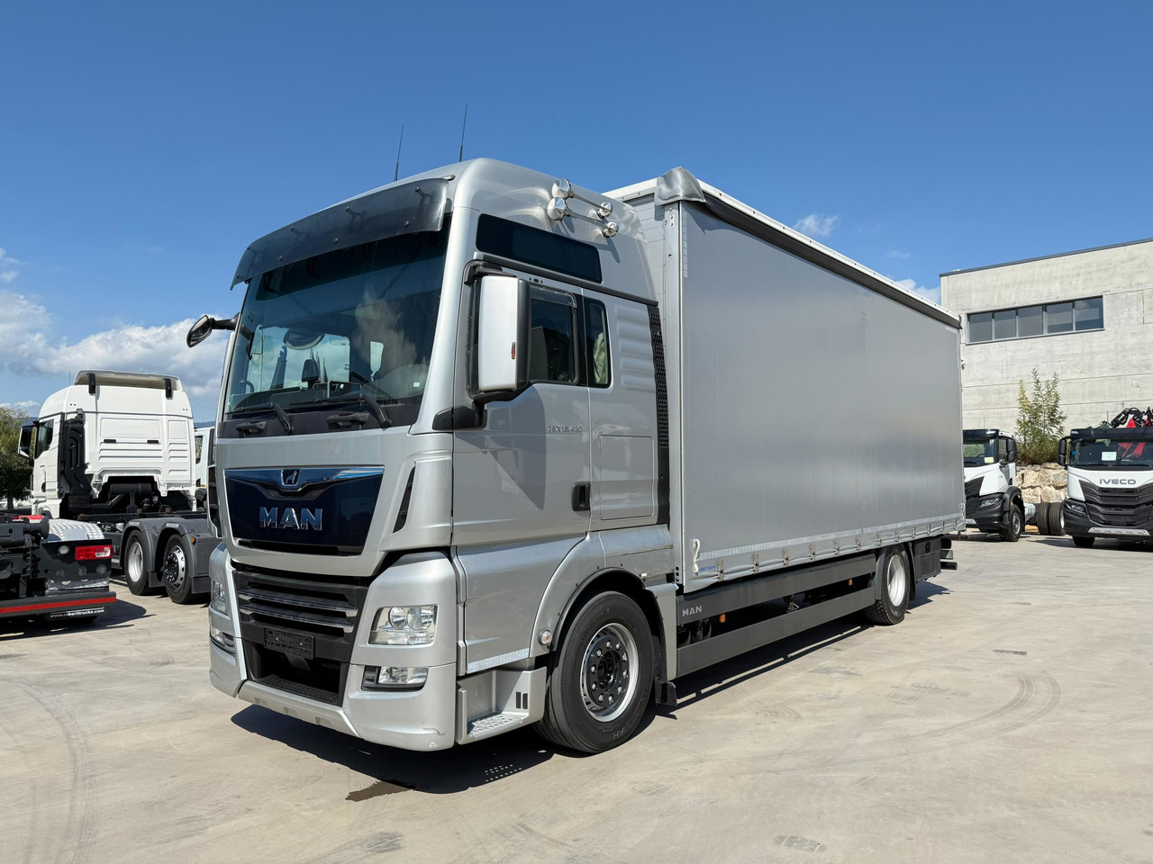 MAN 18.430 LL TGX E6 (Tauliner) - Тентована вантажівка: фото 1 MAN 18.430 LL TGX E6 (Tauliner) - Тентована вантажівка: фото 1