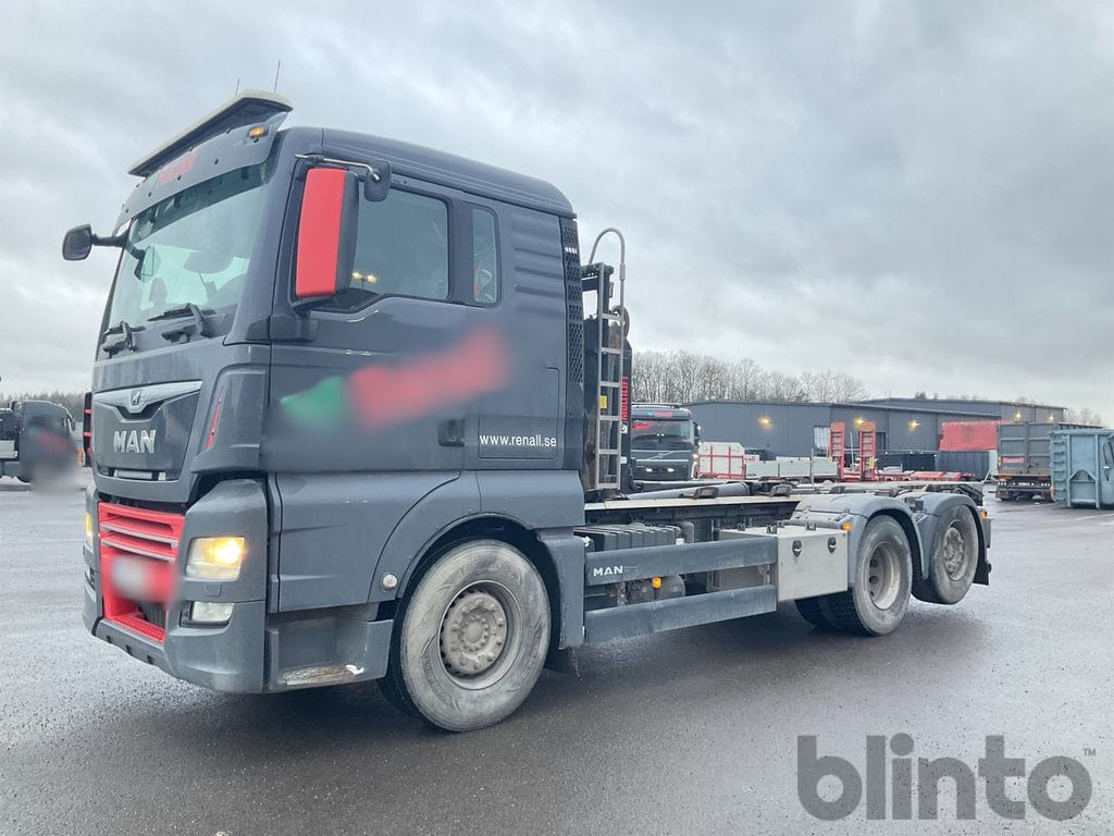 MAN TGX 26.500 6X2-4 BL - Гаковий мультиліфт вантажівка: фото 1 MAN TGX 26.500 6X2-4 BL - Гаковий мультиліфт вантажівка: фото 1