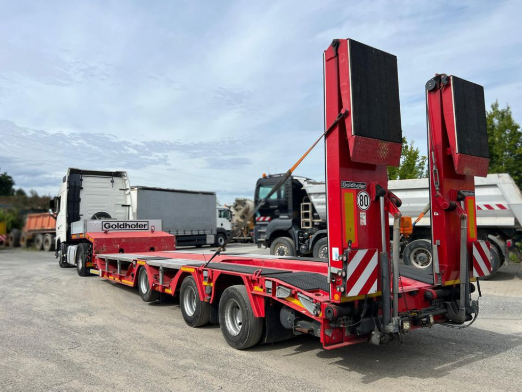 GOLDHOFER Satteltieflader STN-L 3 (245) RM Tiefladerauflieger - Низькорамна платформа напівпричіп: фото 1 GOLDHOFER Satteltieflader STN-L 3 (245) RM Tiefladerauflieger - Низькорамна платформа напівпричіп: фото 1