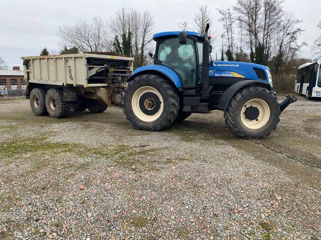 New Holland T7050 (5.638 Betriebs std.) - Трактор: фото 2 New Holland T7050 (5.638 Betriebs std.) - Трактор: фото 2